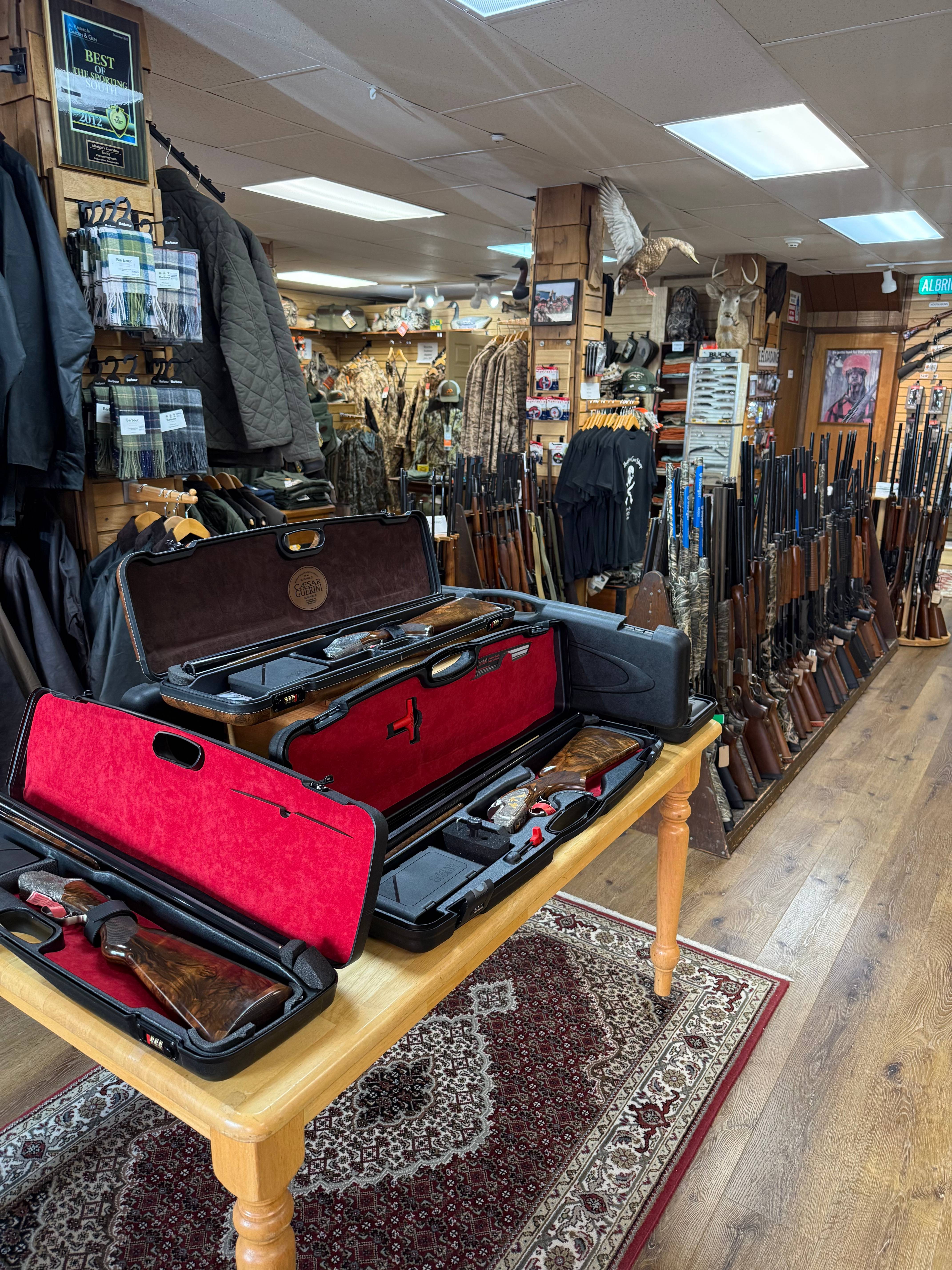 Fine shotguns in display cases